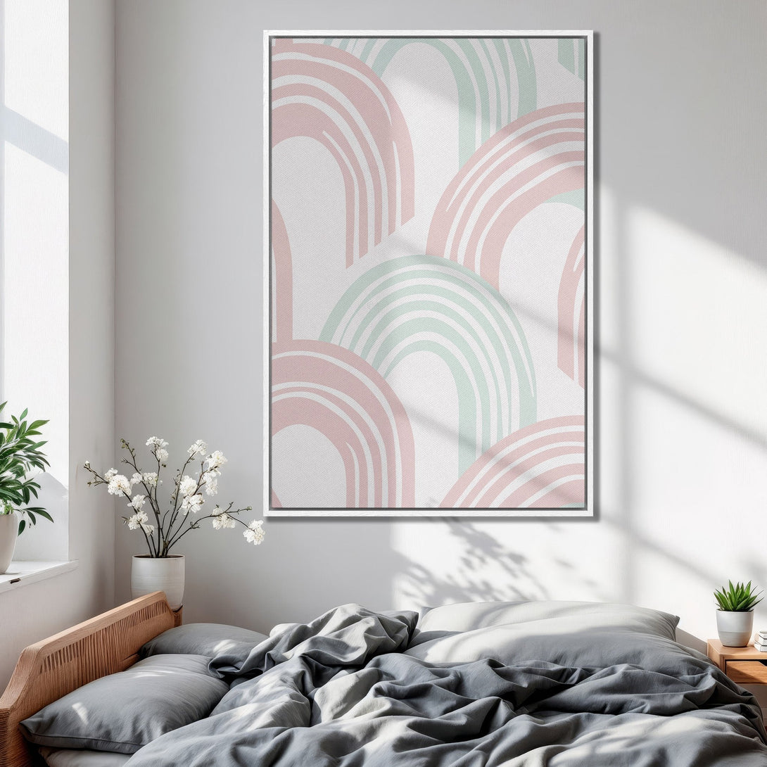Framed Wall Art featuring abstract pastel rainbows in a bedroom. Modern Canvas Print with pink, mint, and white color palette. Perfect for nursery decor.