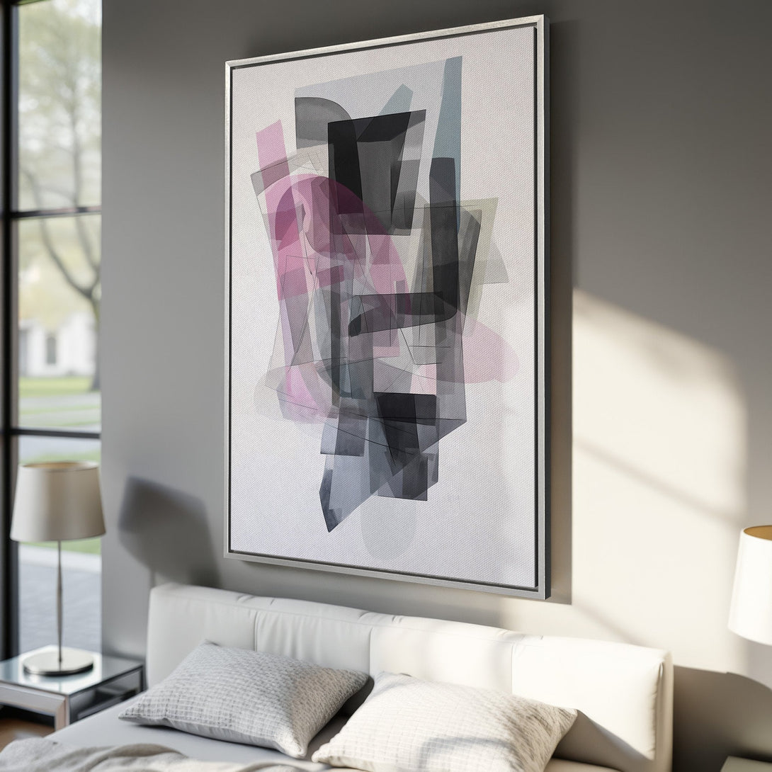 Framed Wall Art featuring an abstract geometric design in pink, gray, and black. Modern canvas print adds a stylish touch to any interior.