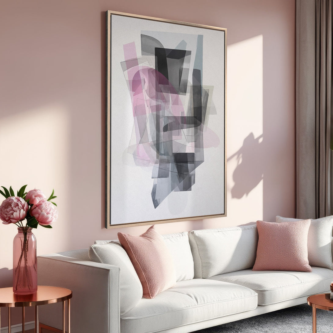 Framed Wall Art: Abstract geometric art in pink, gray, and black. Modern canvas print adds a stylish touch to a living room with a blush color palette.