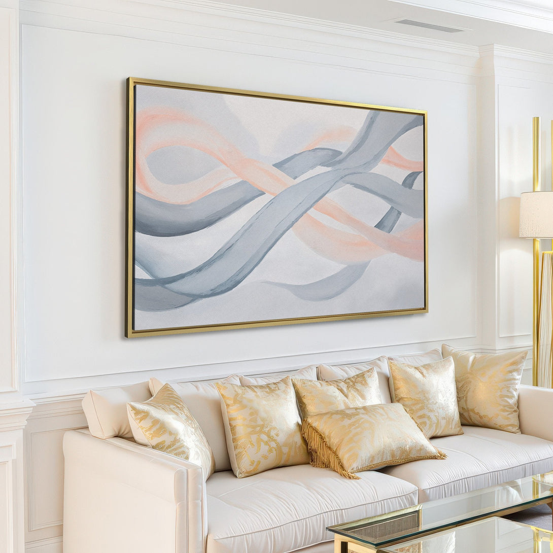 Abstract Canvas Print in a modern living room. Features flowing lines in soft gray and blush tones, perfect for adding a touch of elegance.
