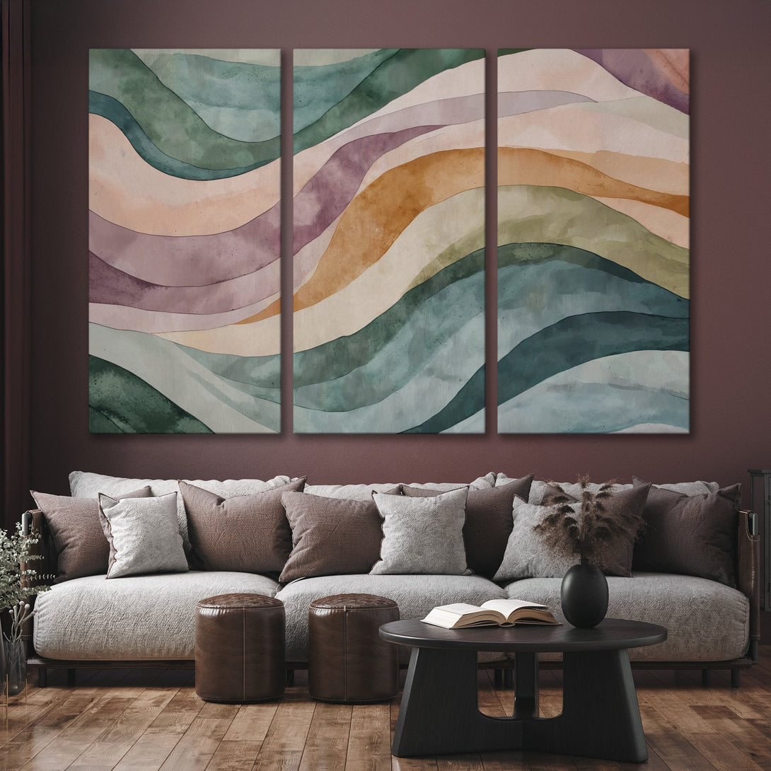 Abstract Canvas Print in watercolor style, featuring flowing waves in muted greens, oranges, and purples. Perfect for modern home decor.