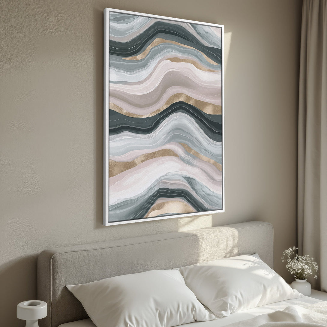 Framed Wall Art featuring an abstract wave design in muted tones of gray, pink, and gold. Perfect for adding a touch of elegance to your bedroom decor.