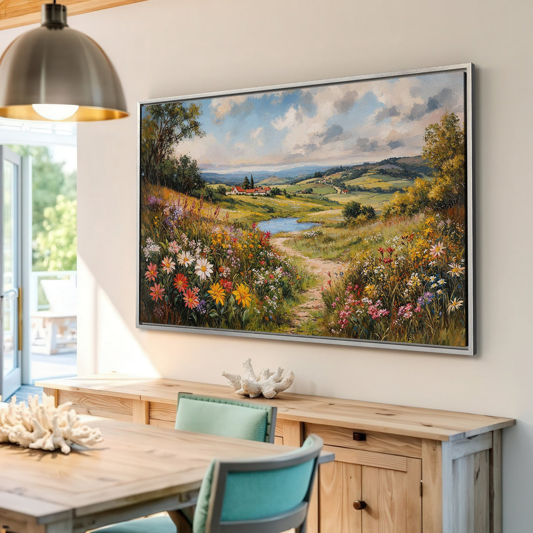 Framed Wall Art: Impressionist landscape Canvas Print with vibrant wildflowers and a serene pond. Earthy tones and a touch of blue create a calming atmosphere.