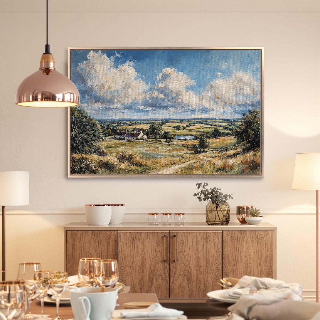 Framed Wall Art: Landscape Canvas Print in a dining room. Features a vibrant blue sky, lush green fields, and a warm, inviting color palette.