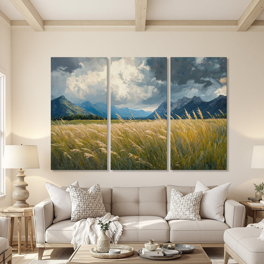 Canvas Print of a mountain landscape painting in a living room. Features a neutral color palette with blues, greens, and golds. Perfect wall art for any home.