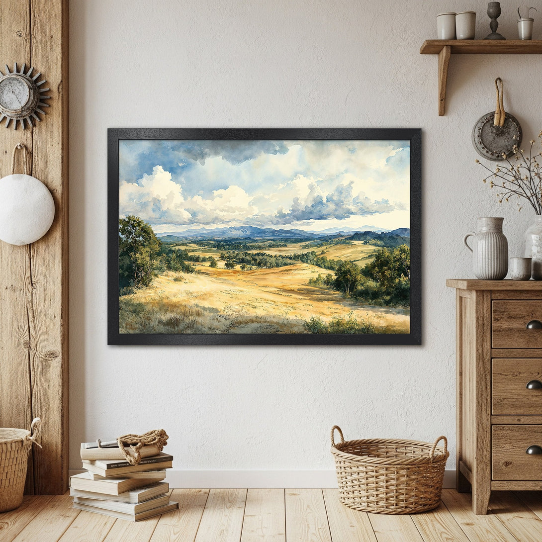 Framed Poster of a watercolor landscape painting. Features a serene countryside scene with a blue, yellow, and green color palette. Perfect wall art.
