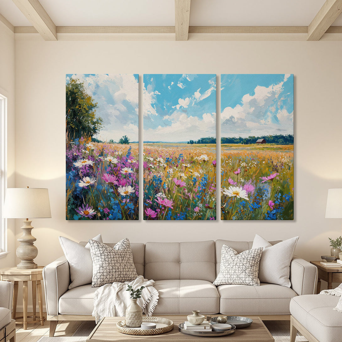 Canvas Print of a vibrant wildflower field painting in a living room. Impressionistic style, featuring blues, pinks, and yellows. Perfect wall art!