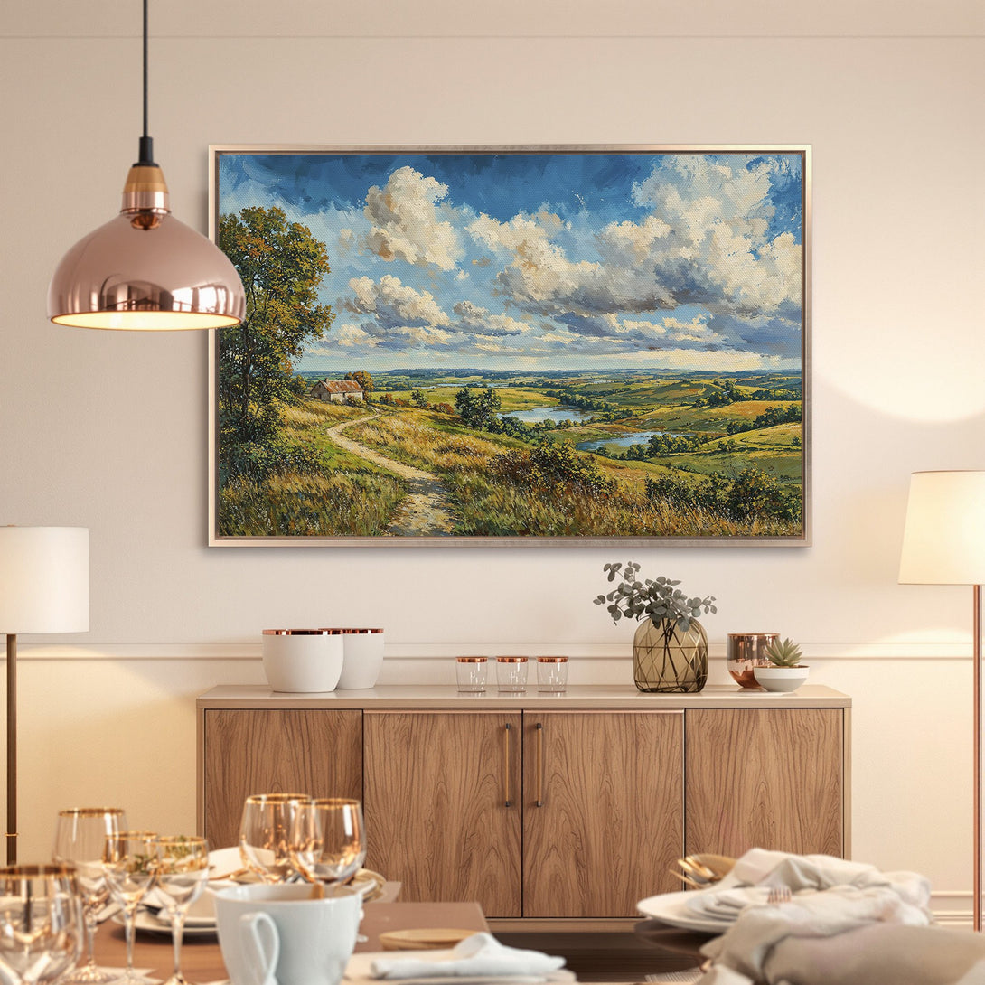 Framed Wall Art: Landscape Canvas Print with rolling hills, blue sky, and warm color palette. Perfect for adding a touch of nature to your home decor.