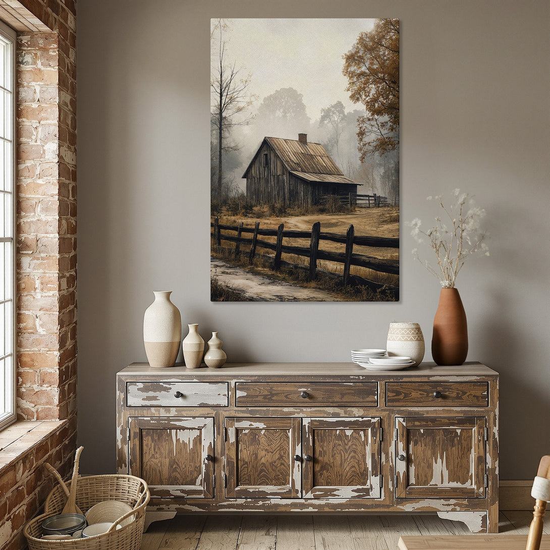 Framed Wall Art featuring a rustic barn scene in a muted, warm color palette. Perfect for adding a touch of farmhouse charm to your home decor.