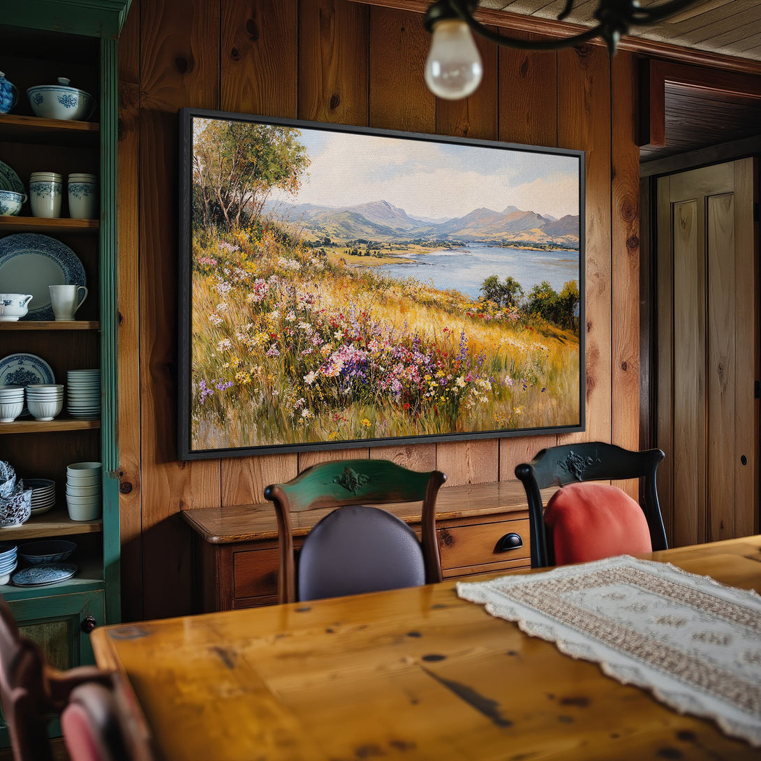 Framed Wall Art: Landscape painting with wildflowers, mountains, and lake. Warm, inviting color palette. Perfect for rustic home decor.
