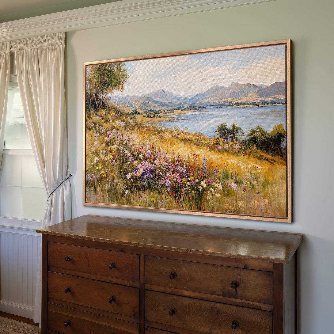 Framed Wall Art: Landscape Canvas Print with a serene meadow scene. Features warm yellow, blue, and green hues, perfect for adding a touch of nature to your home.