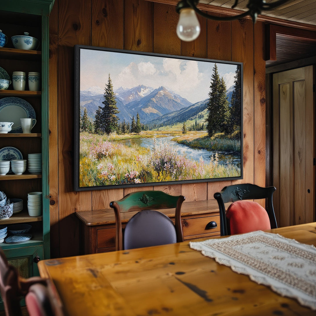 Framed Wall Art: Mountain landscape canvas print in a rustic dining room. Featuring a serene river scene with a cool, natural color palette. Perfect for home decor.