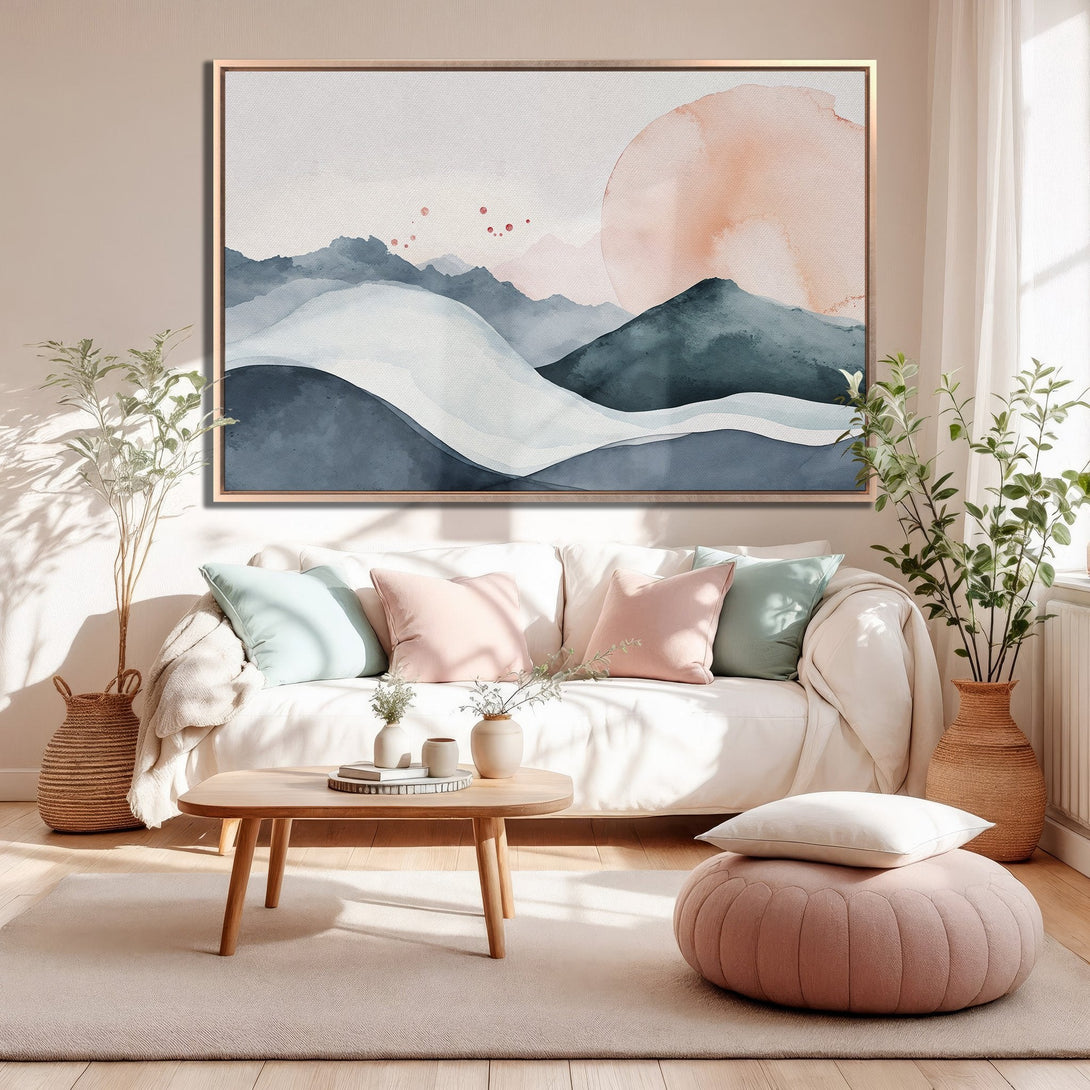 Framed Wall Art of watercolor landscape in a modern living room. Soft, muted blues, pinks & neutrals create a calming aesthetic. Perfect home decor.