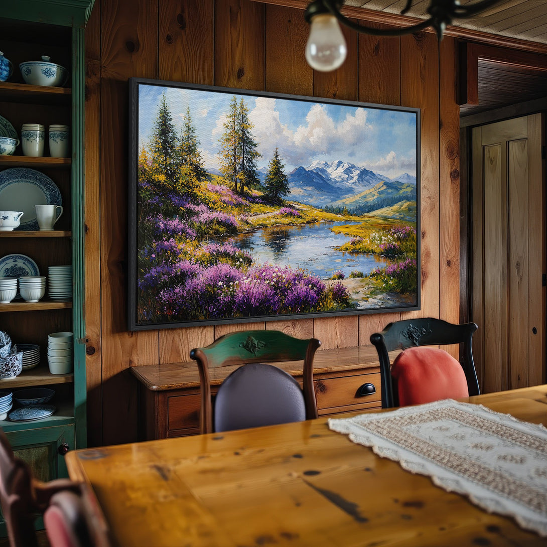 Framed Wall Art: Mountain landscape Canvas Print in a rustic interior. Features a vibrant color palette of blues, greens, and purples.