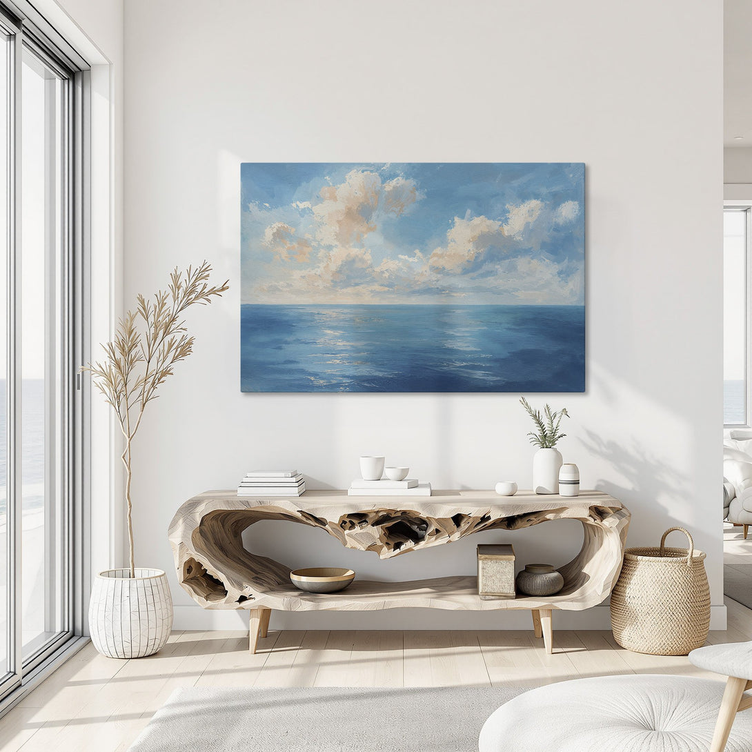 Framed Wall Art featuring an ocean landscape painting in blue and neutral tones. Perfect for coastal decor and adding a touch of serenity to any room.