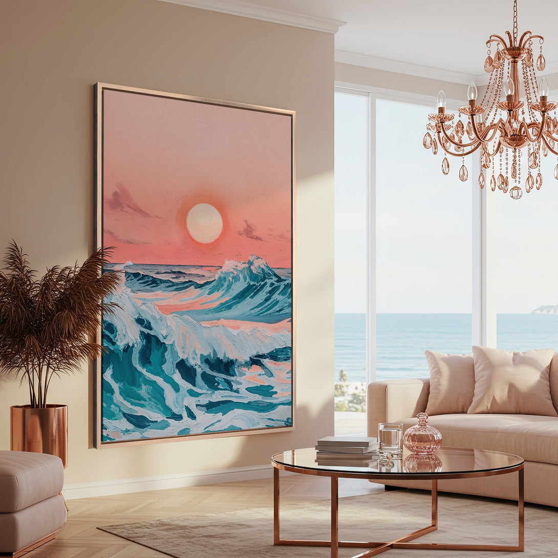 Framed Wall Art: Coastal sunset canvas print in a modern living room. Features ocean waves in teal and pink hues, adding a touch of serenity.