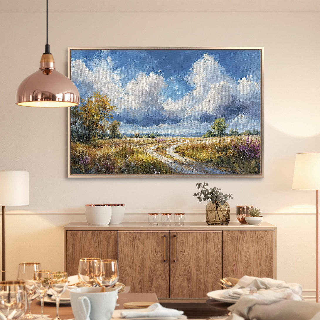 Framed Wall Art: Landscape Canvas Print with blue sky, clouds, and a path through a field. Warm, inviting color palette for any room.