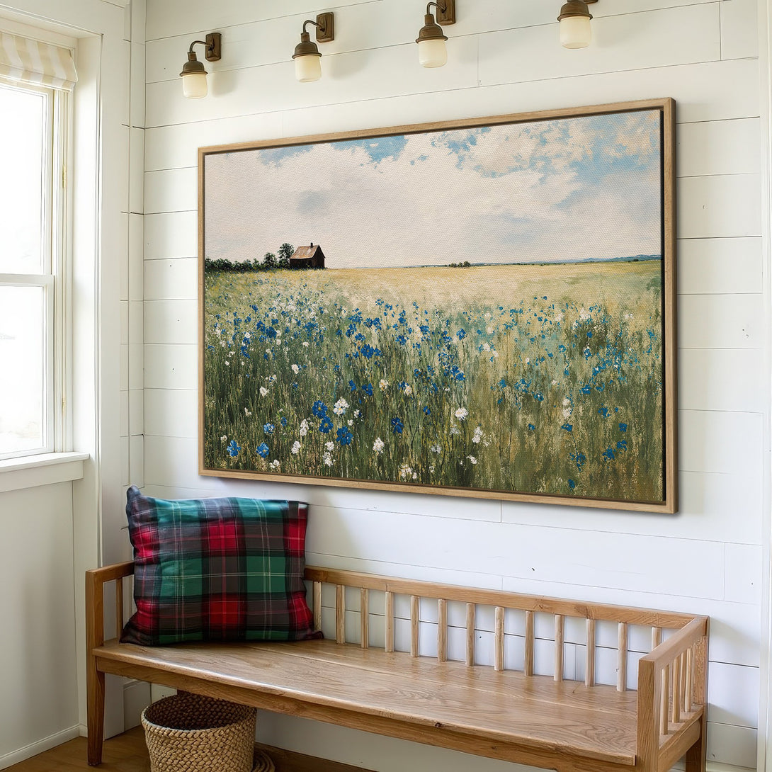 Framed Wall Art of a field with blue flowers, farmhouse style, in a neutral and green color palette. Perfect for rustic home decor.