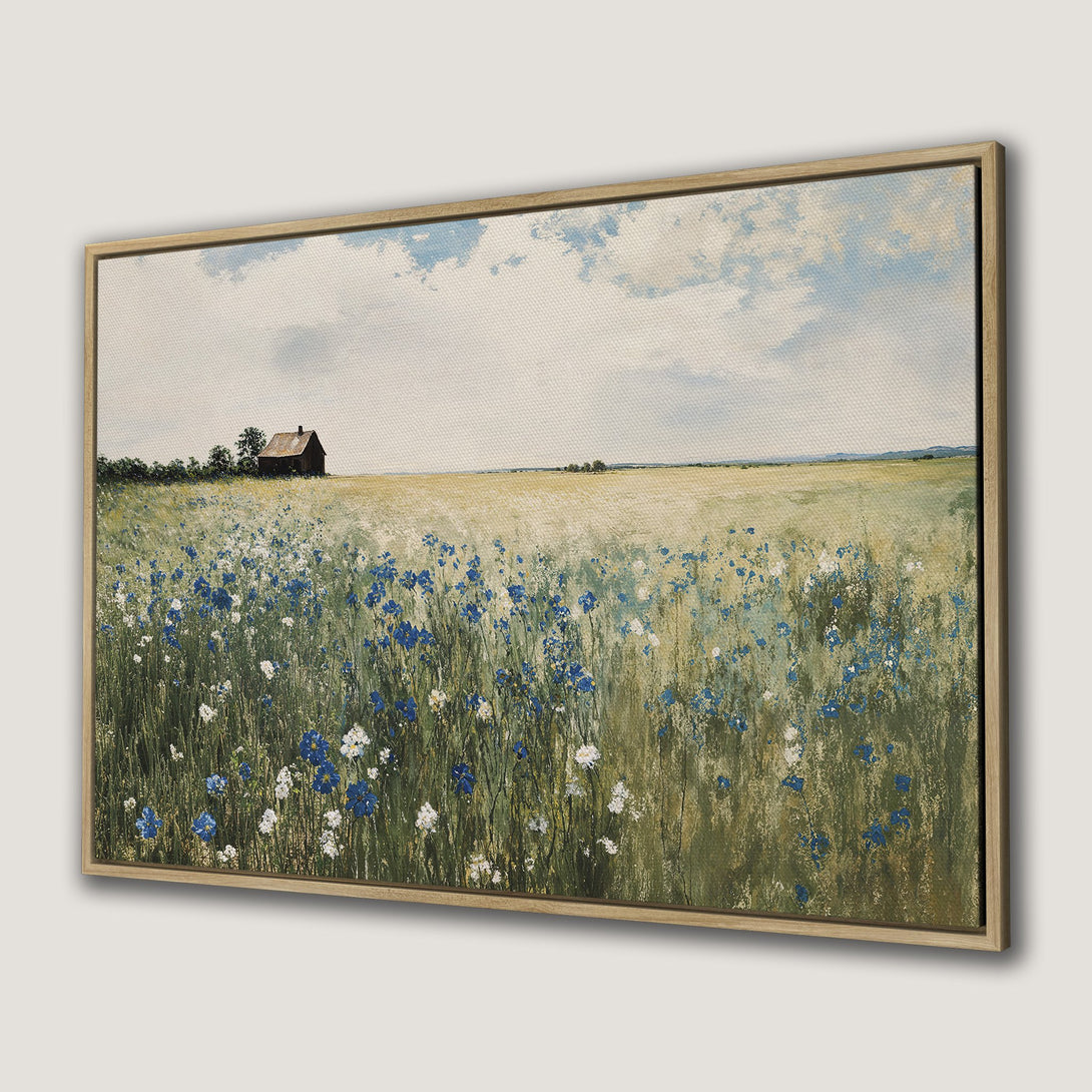 Framed Wall Art of a field of blue and white wildflowers, impressionist style, with a neutral, earthy color palette.