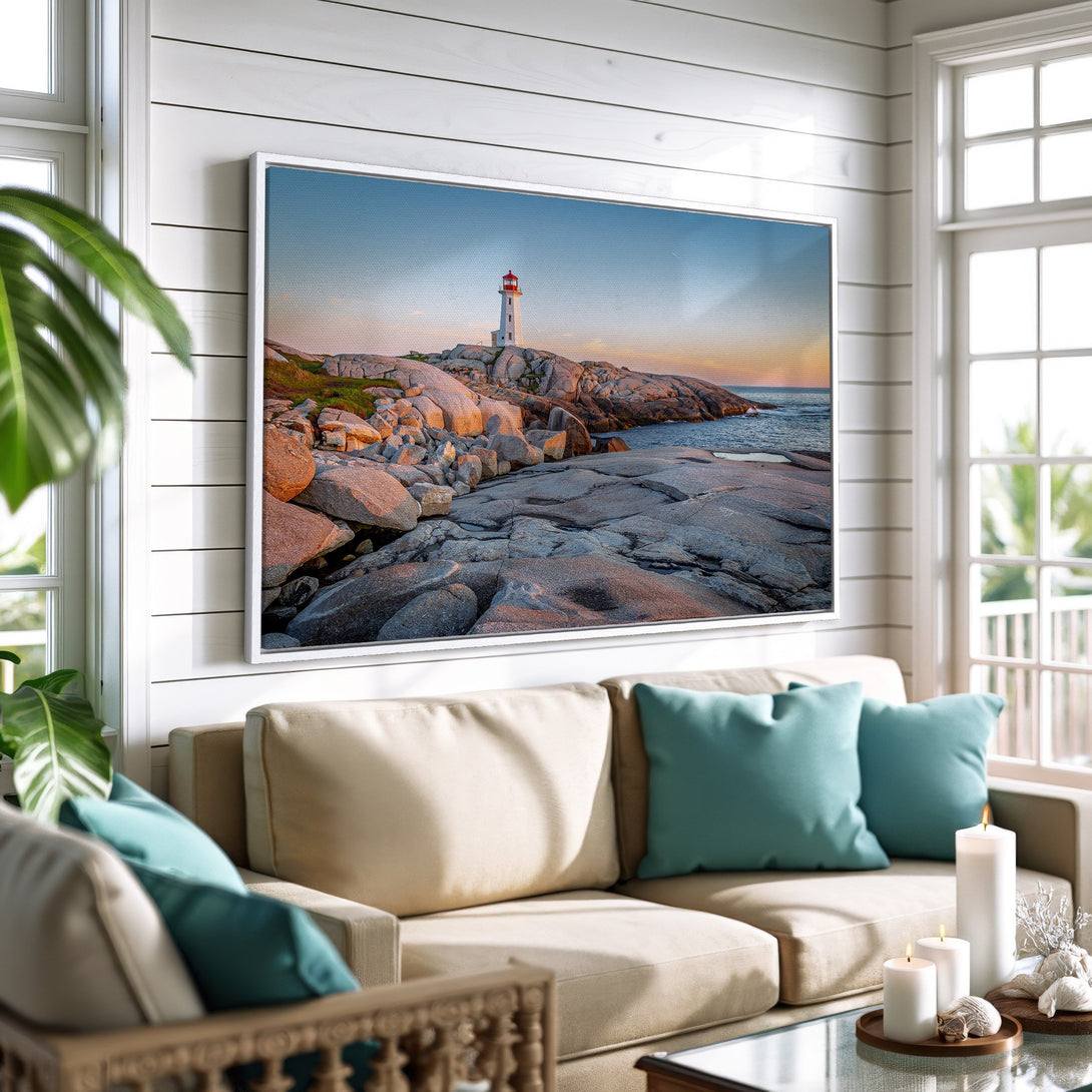 Framed Wall Art of a lighthouse on rocky coast in warm tones. Coastal decor inspiration for your home.