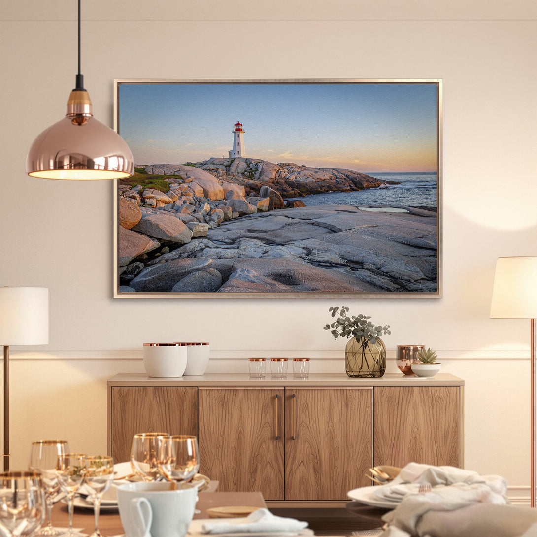 Framed Wall Art: Lighthouse Canvas Print. Coastal landscape art in warm sunset tones. Perfect for adding a touch of serenity to your home decor.