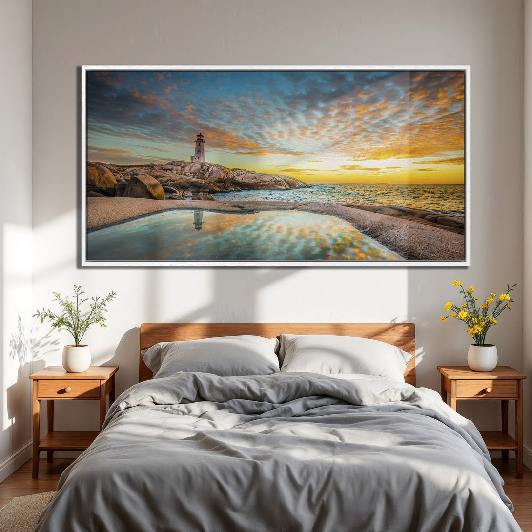 Framed Wall Art: Lighthouse landscape Canvas Print with vibrant sunset colors. Coastal art for bedroom decor, featuring blues, oranges, and yellows.