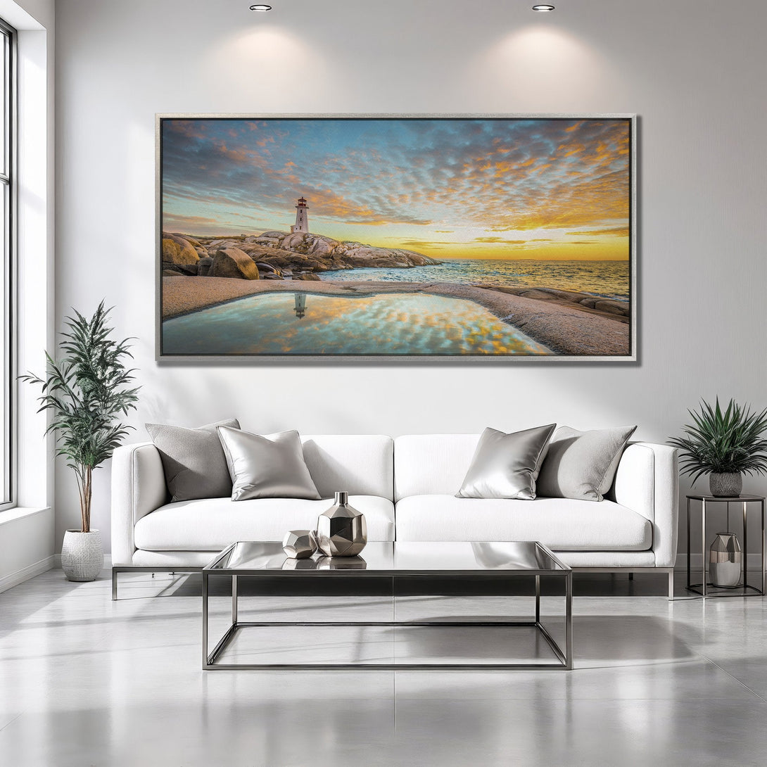 Framed Wall Art featuring a lighthouse at sunset with vibrant orange and blue hues. Coastal landscape canvas print for a serene home decor.