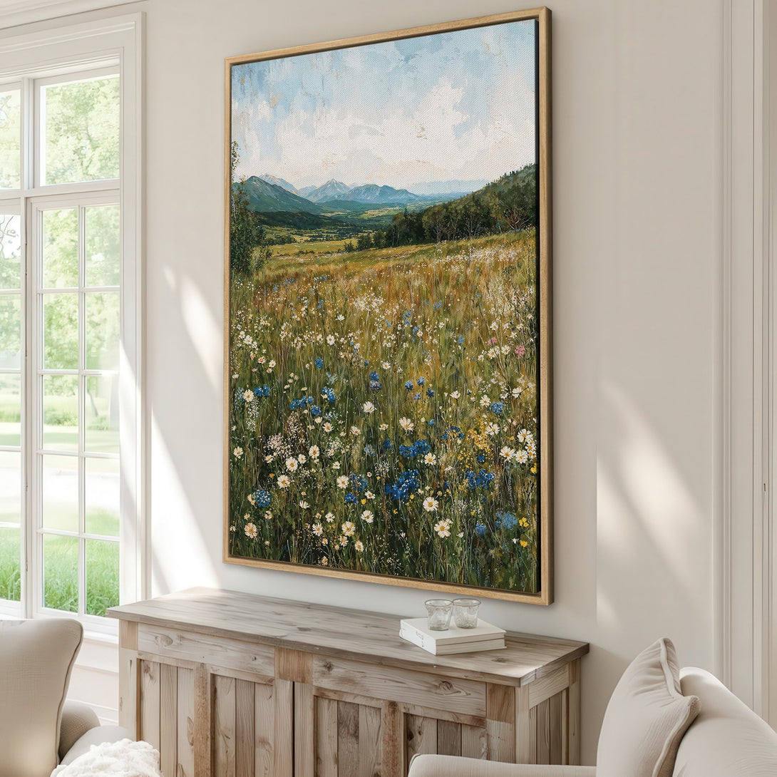 Framed Wall Art: Landscape painting with wildflowers in a meadow, featuring a green, blue, and yellow color palette. Perfect for adding a touch of nature to your home.