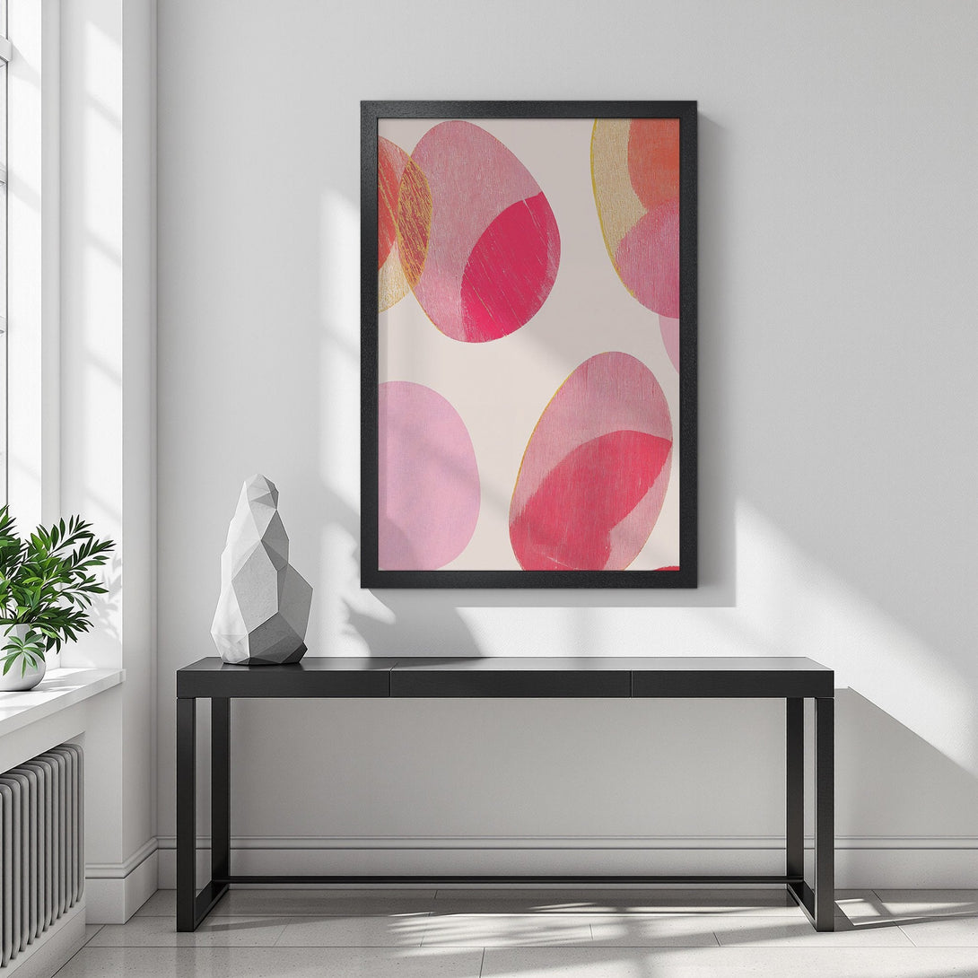 Framed Poster featuring abstract pink and gold shapes. Modern art style with a warm, vibrant color palette. Add a pop of color to your space!