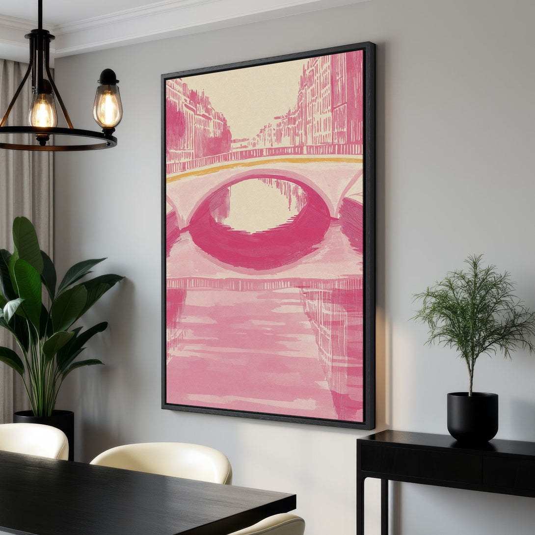 Framed Wall Art featuring a pink watercolor bridge scene. Modern style with a soft, monochromatic pink and beige color palette. Perfect for adding a pop of color!