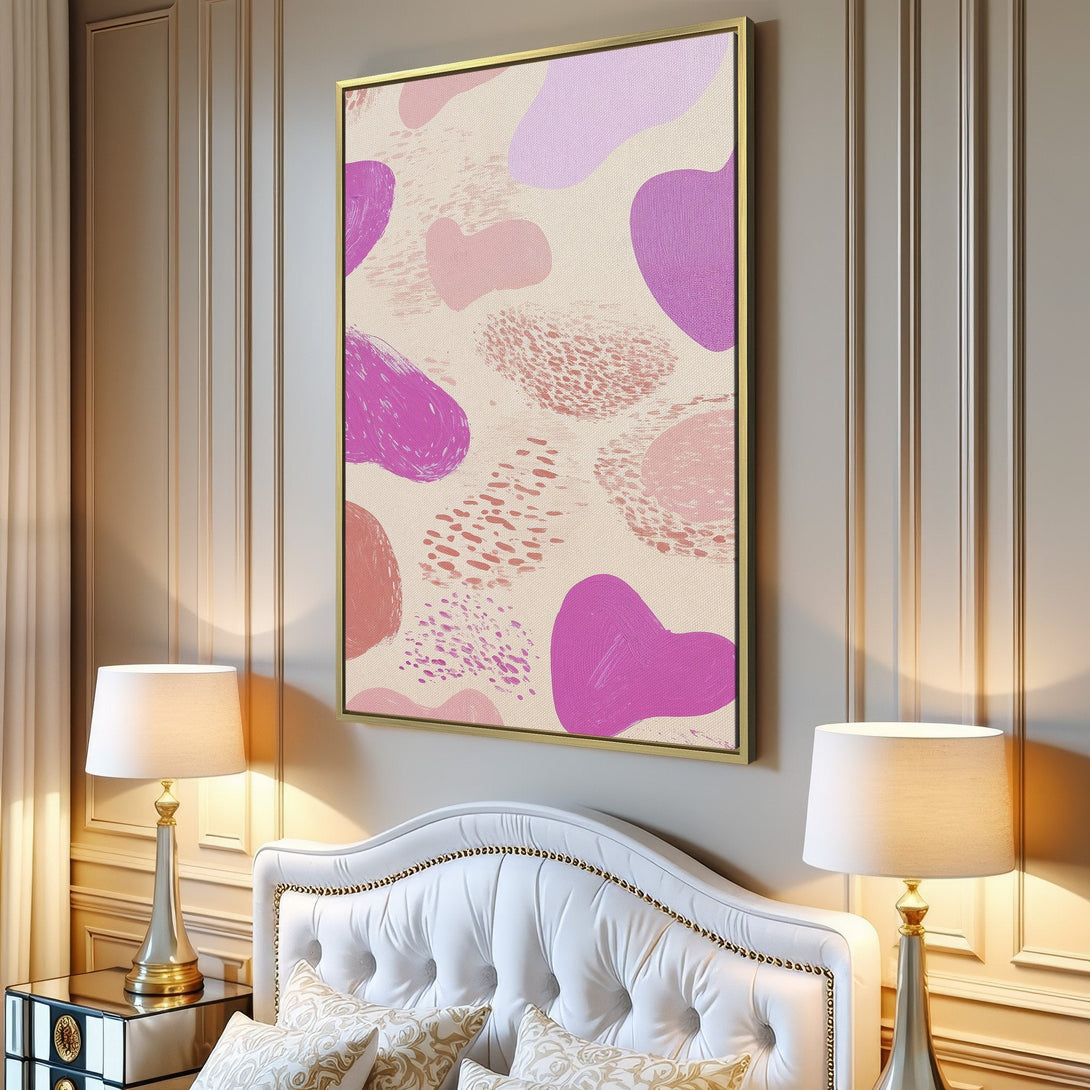 Abstract Canvas Print art in a modern interior. Features organic shapes in pink, purple, and peach tones. Perfect for adding a pop of color to your space!
