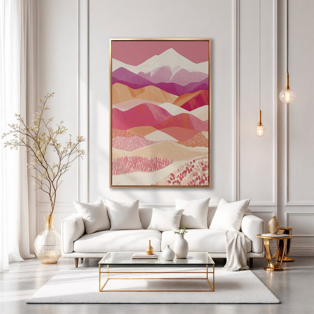 Framed Wall Art: Abstract mountain landscape in pink and peach tones. Modern art print adds a pop of color to this elegant living room.