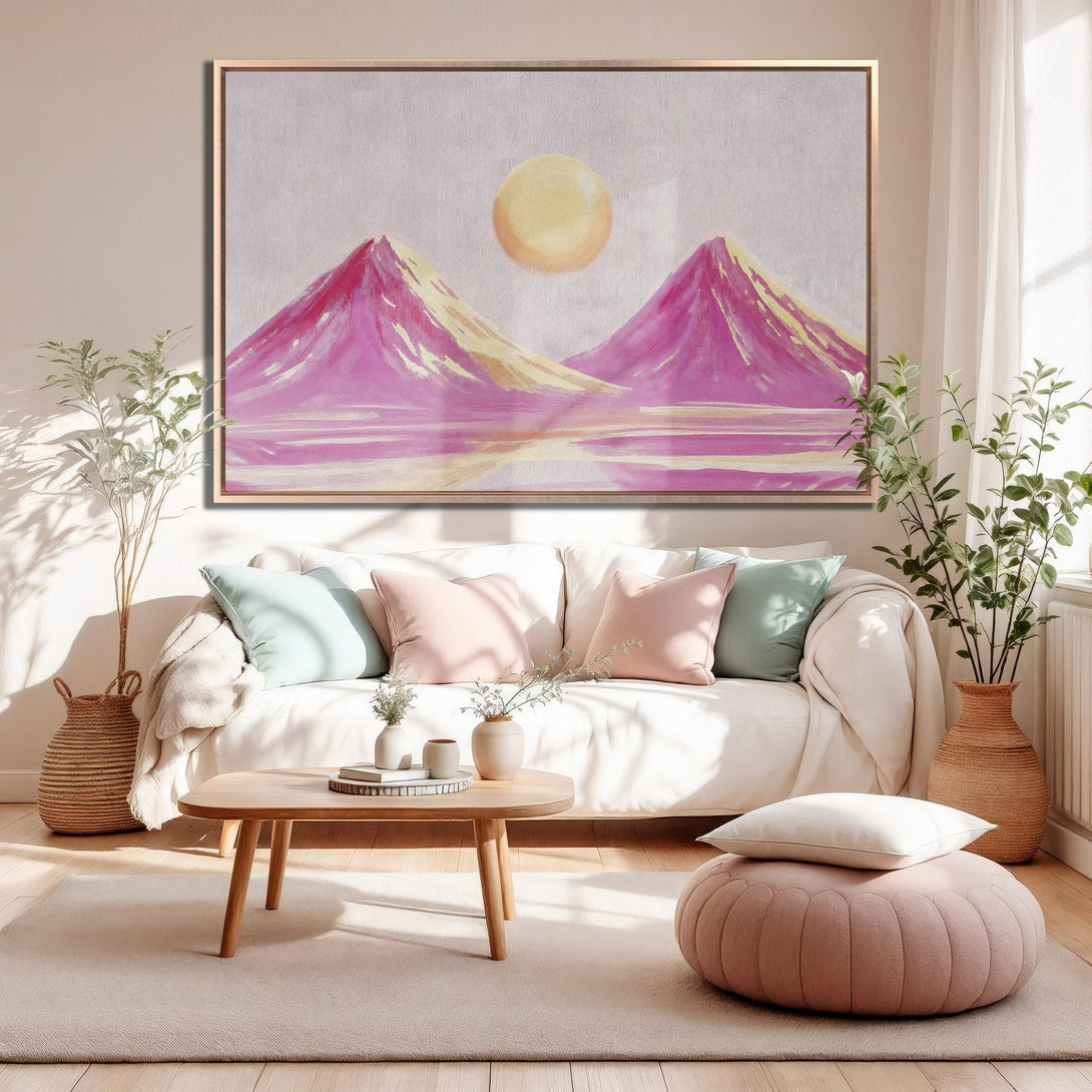 Framed Wall Art of pink mountains and sun, abstract style, displayed in a modern living room with a neutral color palette.