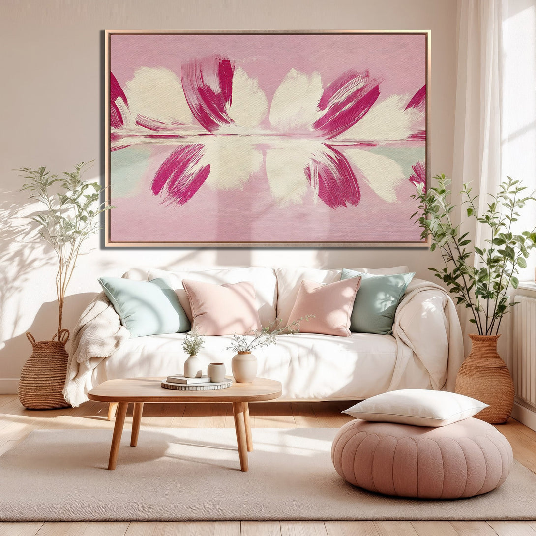 Framed Wall Art: Abstract floral canvas print in pink and cream tones, perfect for adding a touch of modern art to your living room decor.