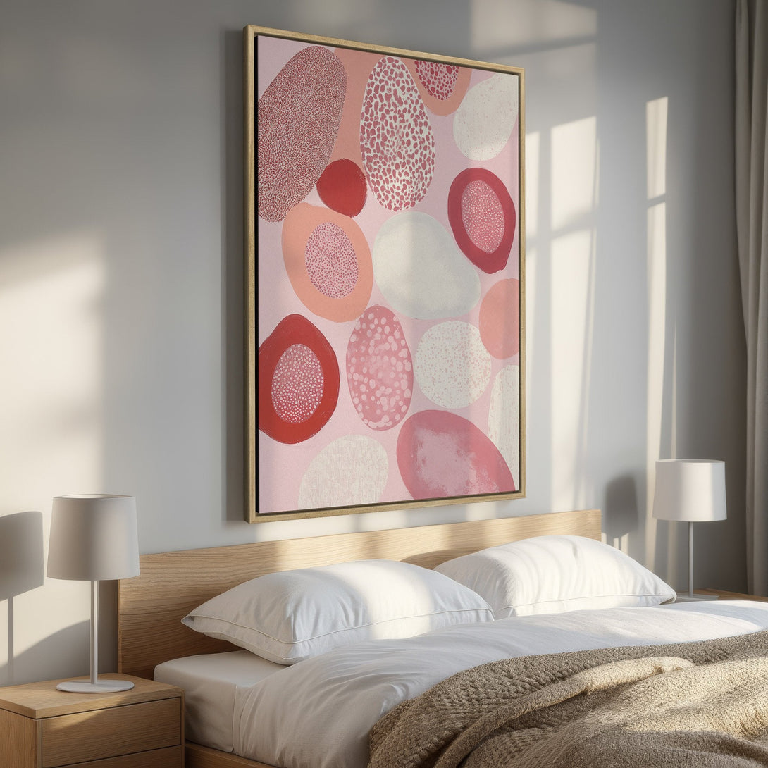 Framed Wall Art with abstract pink and red shapes. Modern art canvas print for bedroom decor. Soft, warm color palette.