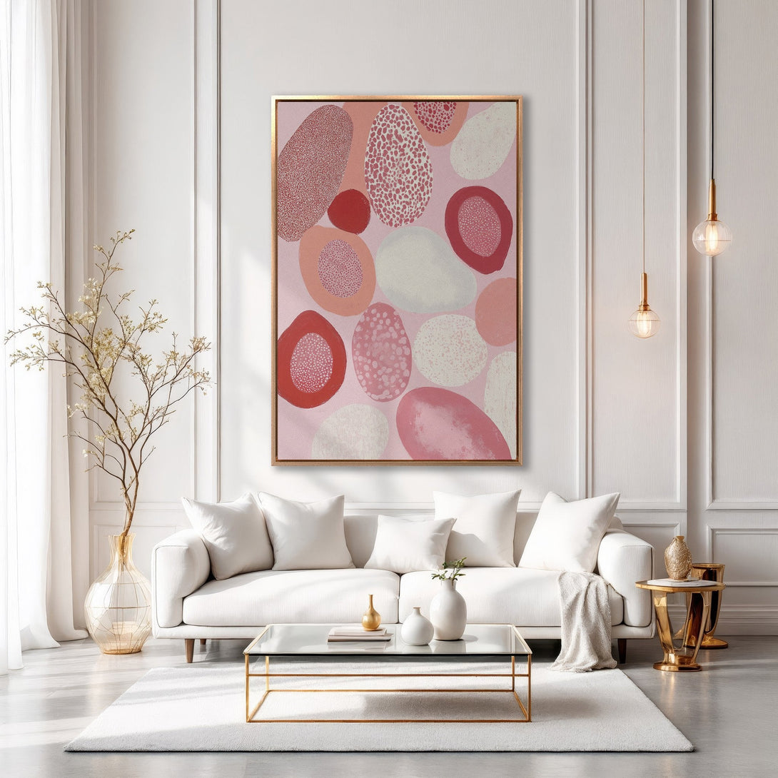 Framed Wall Art featuring abstract shapes in pink and red tones, displayed in a modern living room setting. Enhance your space with stylish wall decor!