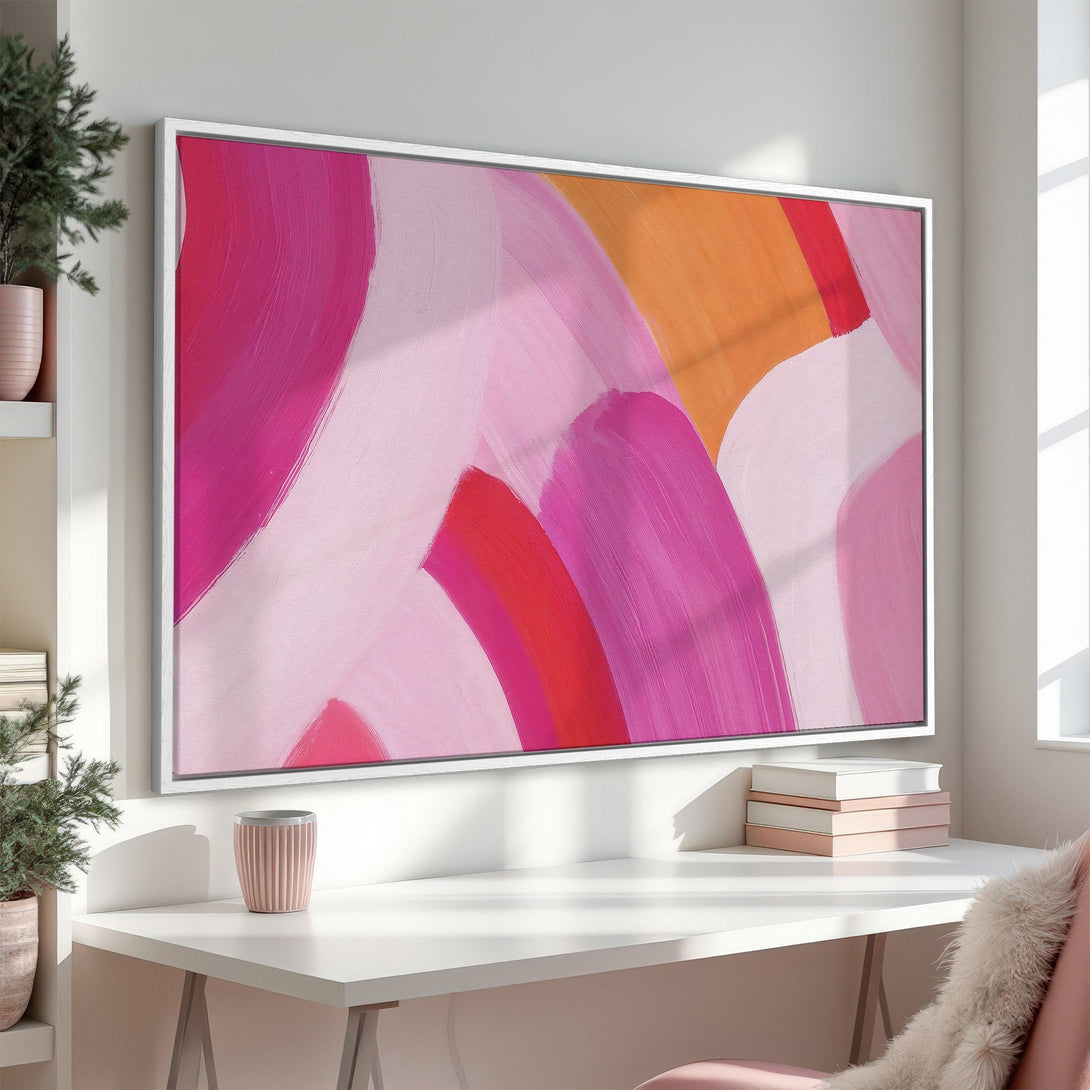 Framed Wall Art: Abstract pink and orange brushstroke canvas print, modern art for home decor. Bright and stylish interior design.
