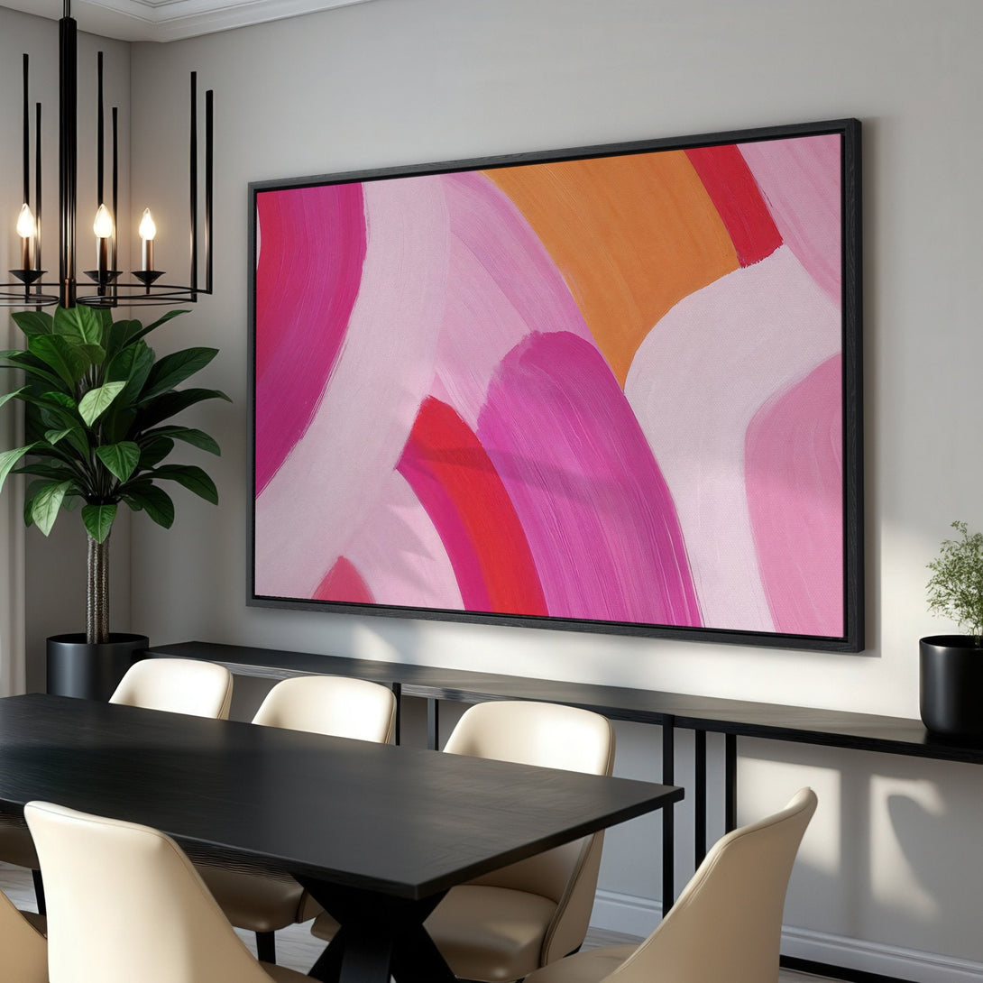 Framed Wall Art: Abstract painting in pink, red, and orange hues. Modern art style, perfect for adding a pop of color to any interior space.