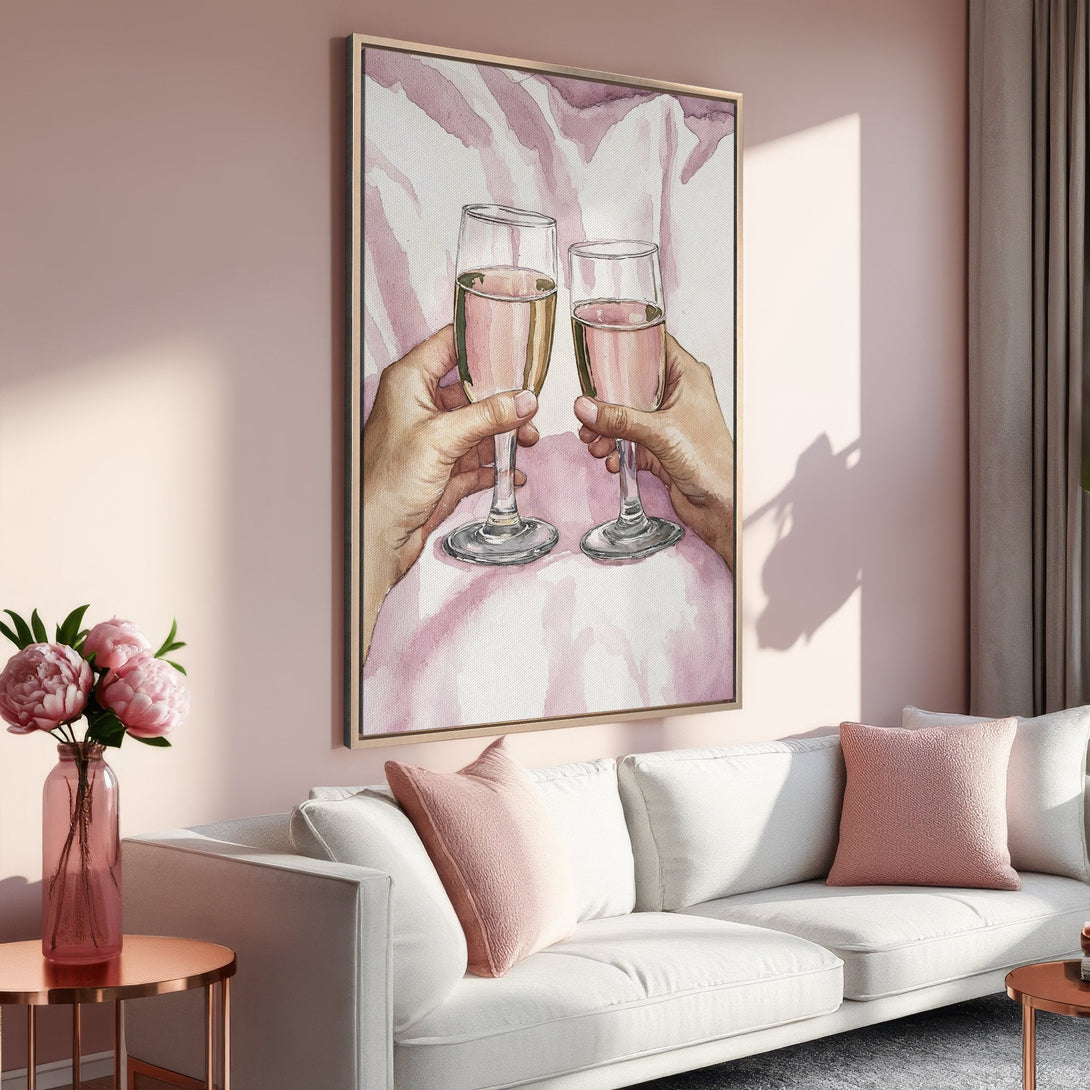 Framed Wall Art featuring a watercolor painting of champagne flutes, in a blush and pink color palette. Perfect for adding a touch of elegance to any room.