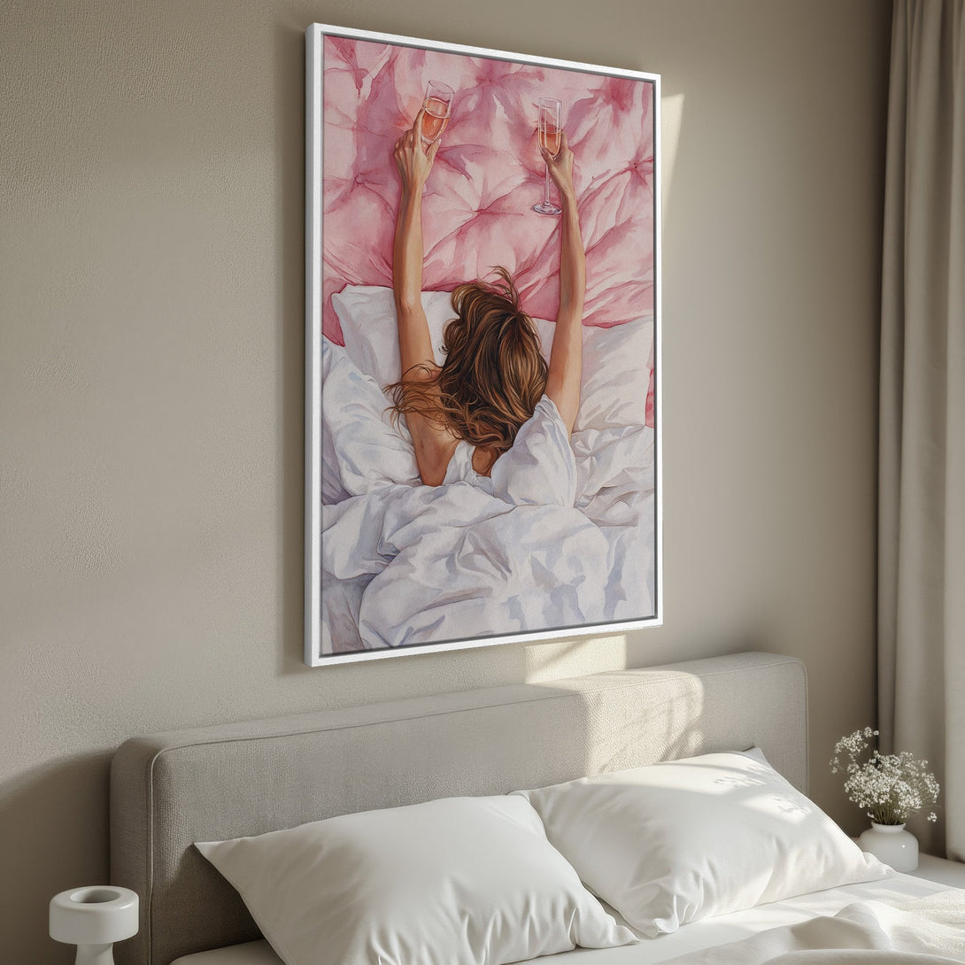 Framed Wall Art of woman in bed with champagne, watercolor style, pink and white palette. Perfect for bedroom decor.