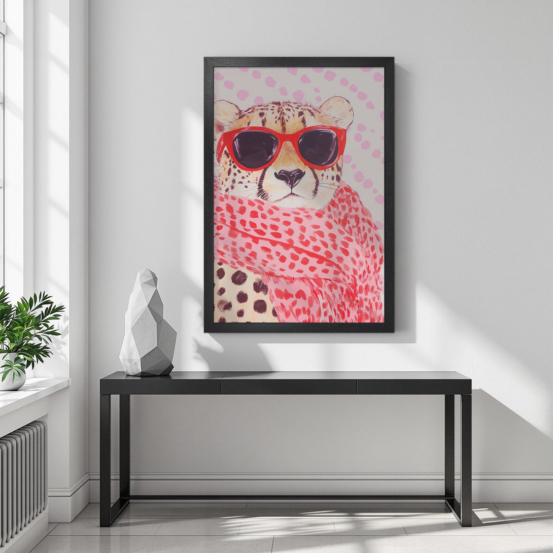 Framed Poster of a stylish cheetah wearing sunglasses and a scarf, modern art style with a pink and red color palette.