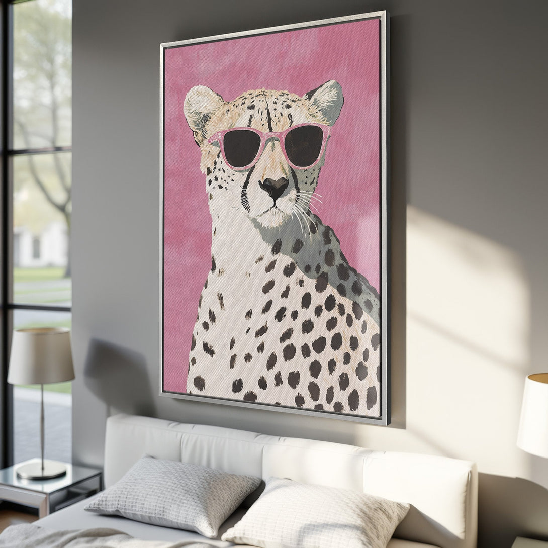 Framed Wall Art: Cool cheetah wearing pink sunglasses. Modern pop art style with a pink and neutral color palette. Perfect for a stylish home!