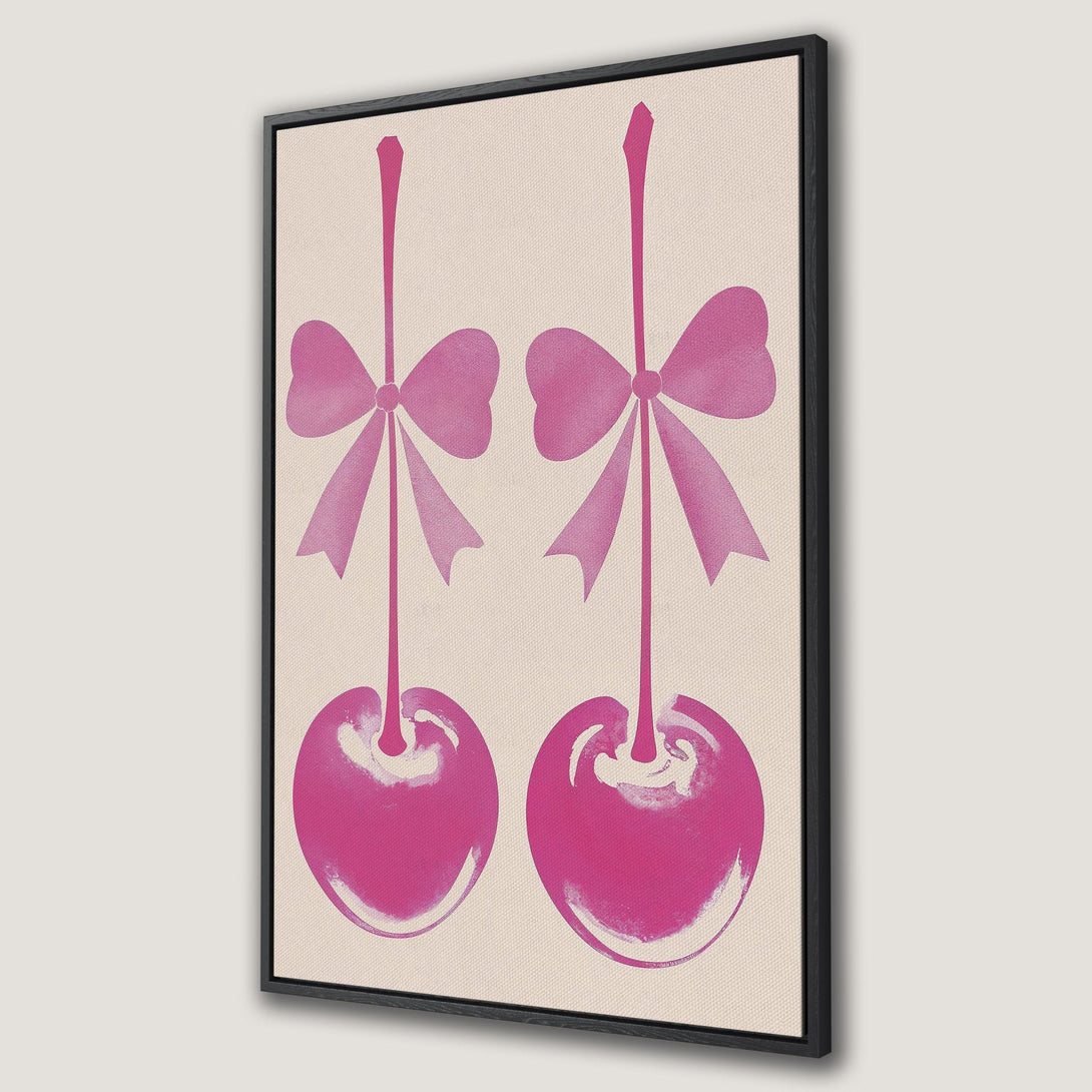 Framed Wall Art featuring two pink cherries with bows on a neutral background. Modern, pop art style canvas print, perfect for kitchen or dining room decor.