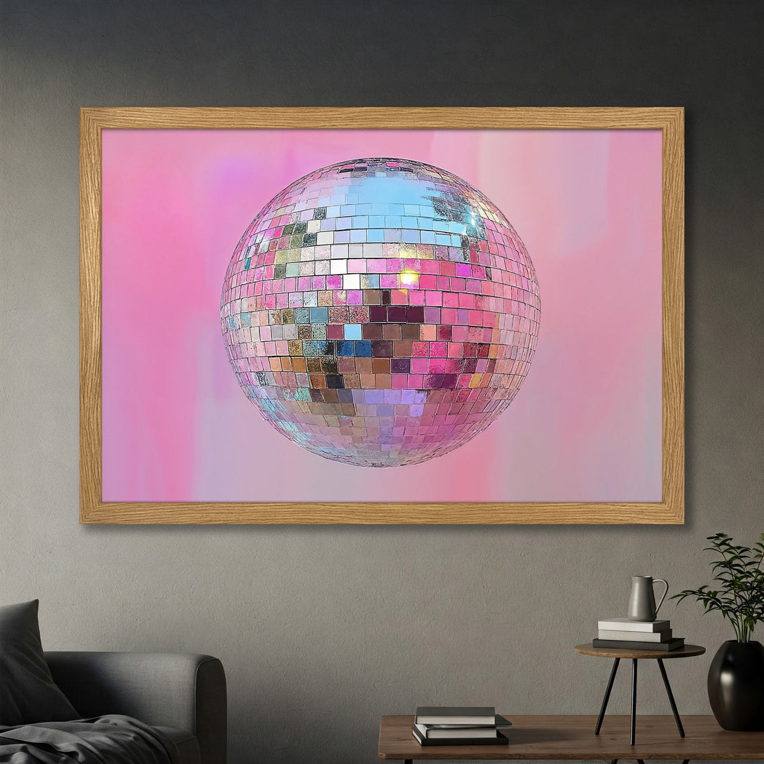 Framed Poster featuring a disco ball with a pink and silver color palette, perfect for adding a touch of retro style to any space.