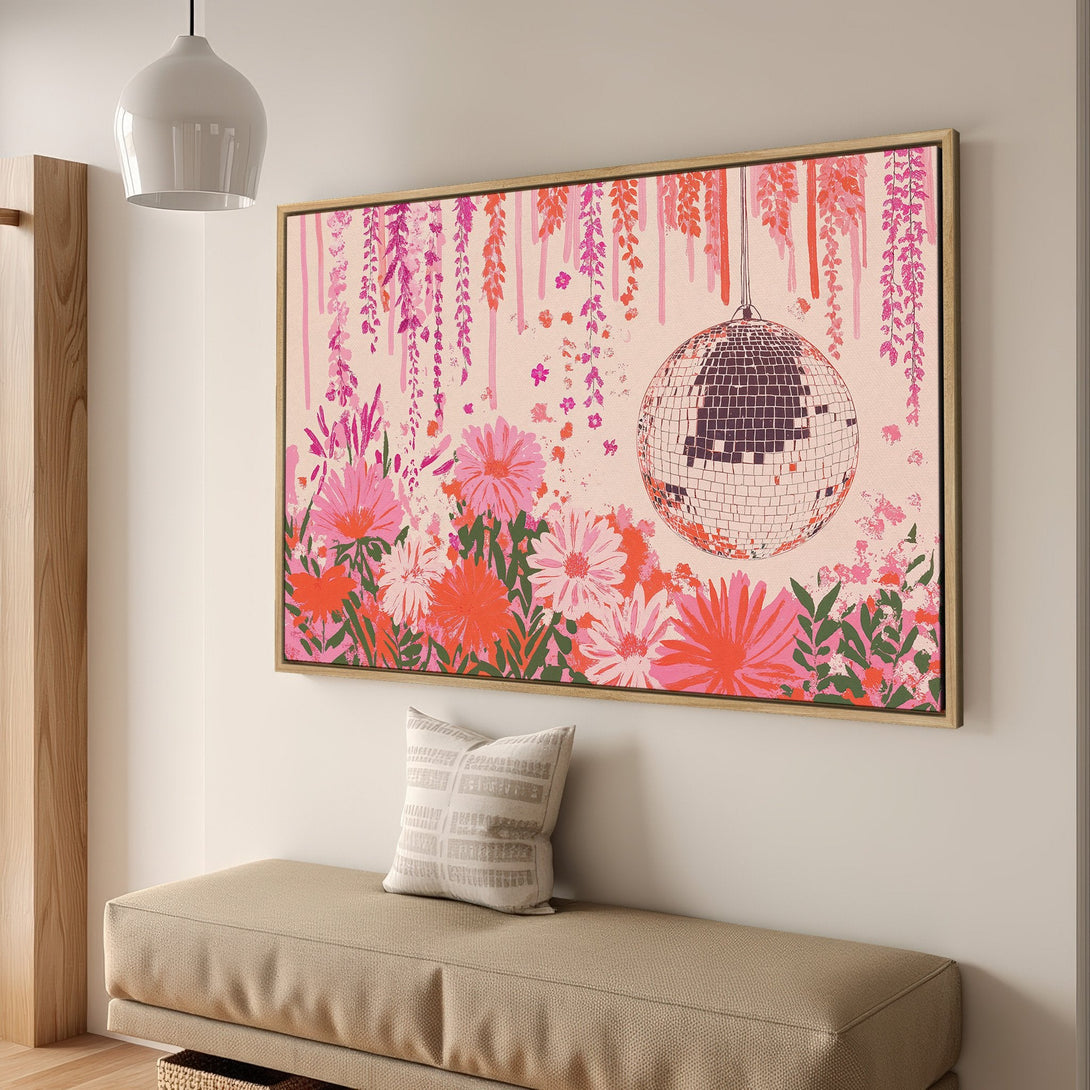 Framed Wall Art featuring a disco ball and floral design in a vibrant pink and orange color palette. Modern art for your home!