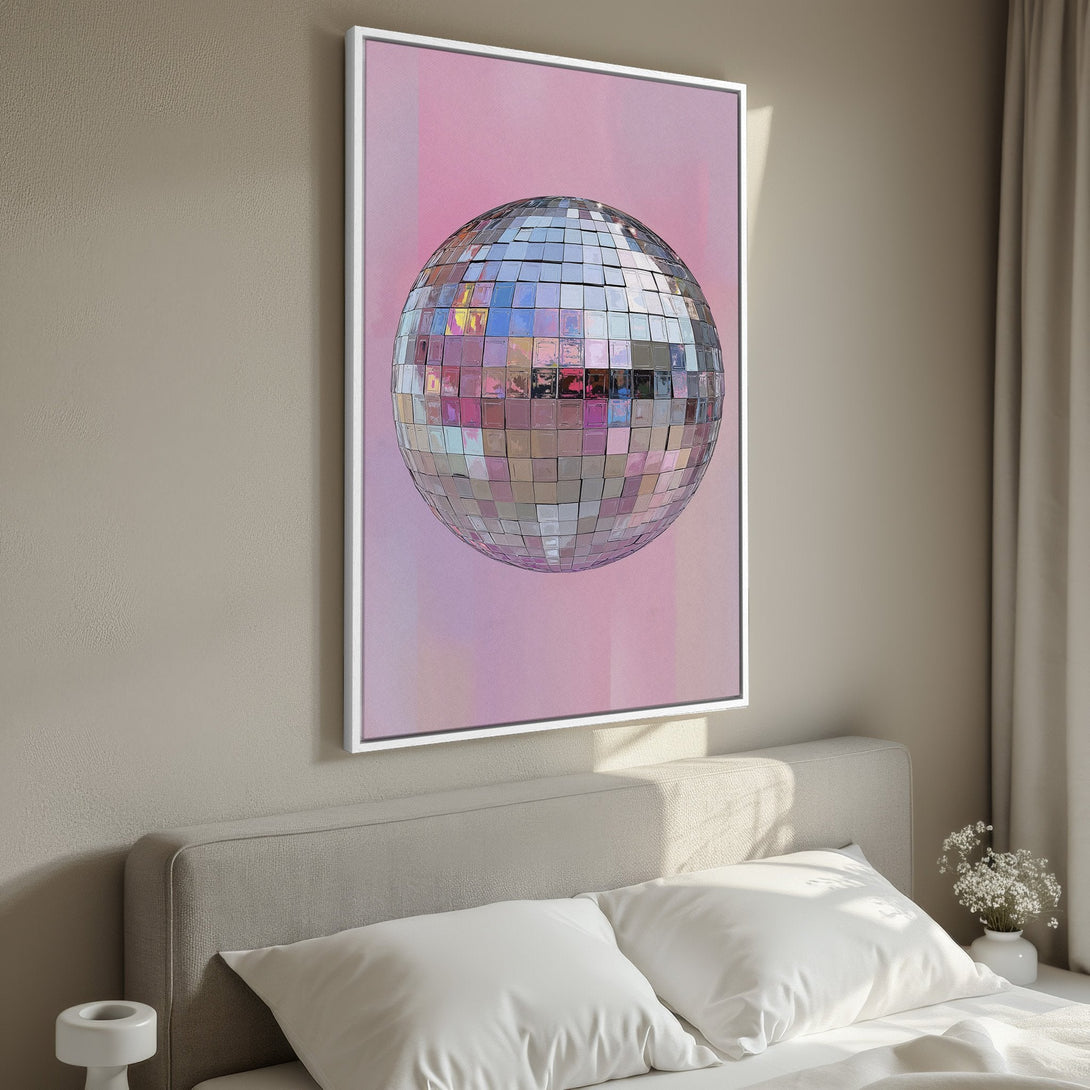 Framed Wall Art featuring a disco ball against a pink backdrop. Modern style with a soft, pastel color palette, perfect for adding a touch of glam to your space.