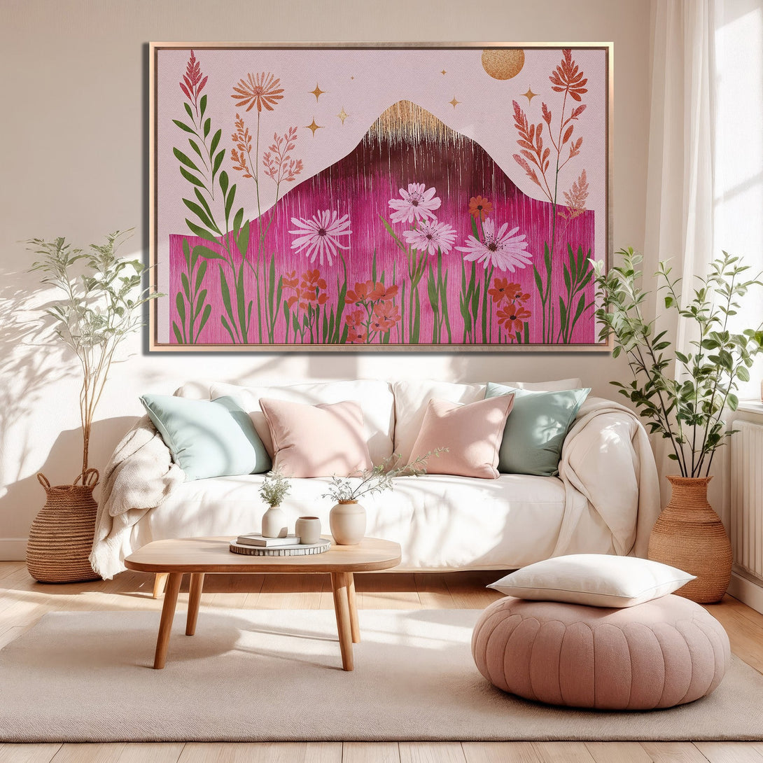 Framed Wall Art featuring a vibrant pink floral landscape with a gold mountain. Modern, bohemian style in a warm, inviting color palette.