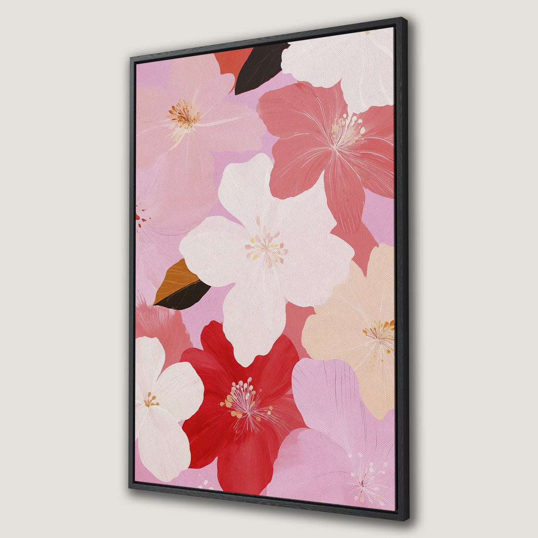 Framed Wall Art featuring abstract floral design in pink, red, and white. Modern canvas print perfect for adding a pop of color to any room.