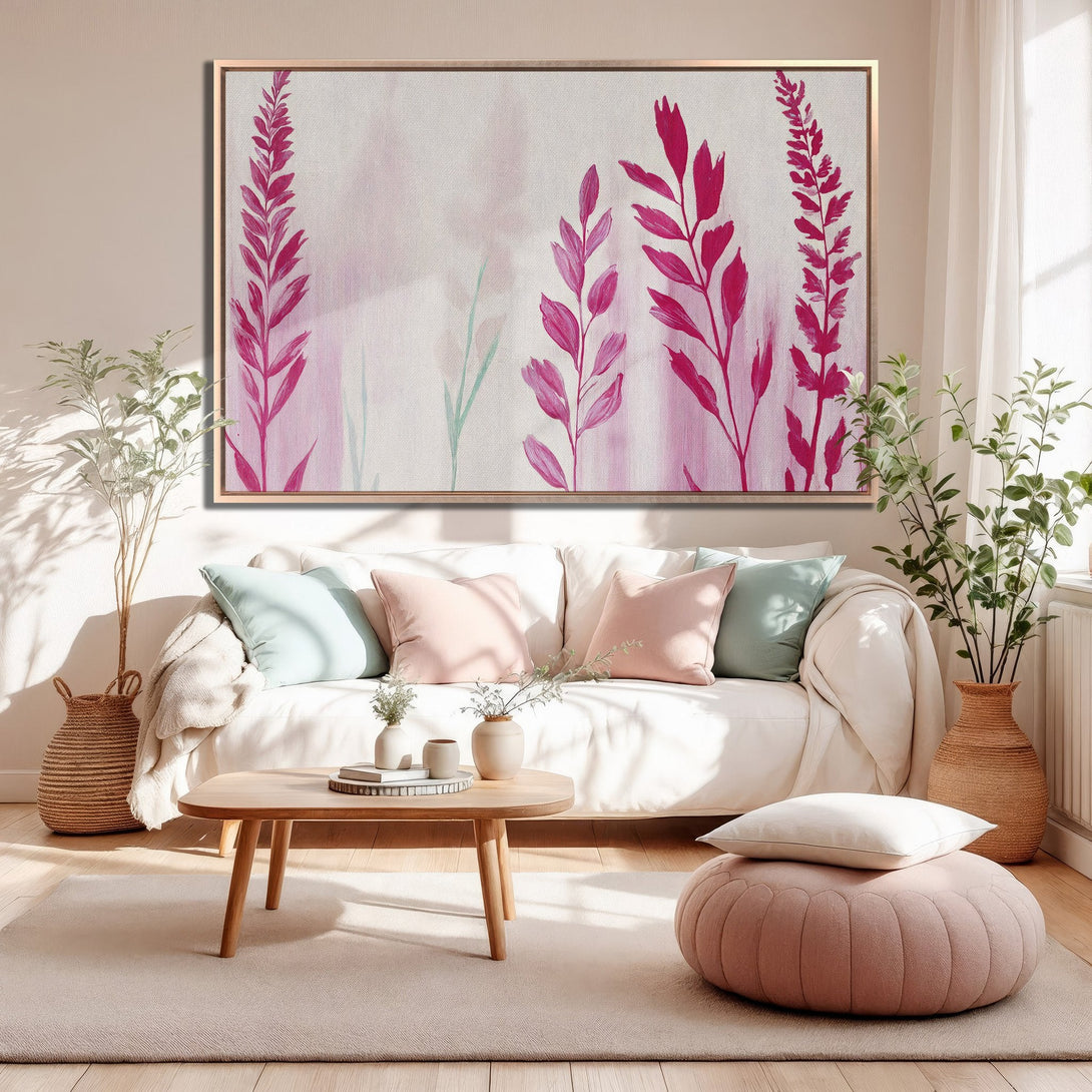 Framed Wall Art featuring a botanical abstract in pink hues. Modern canvas print adds a touch of elegance and color to any living room.