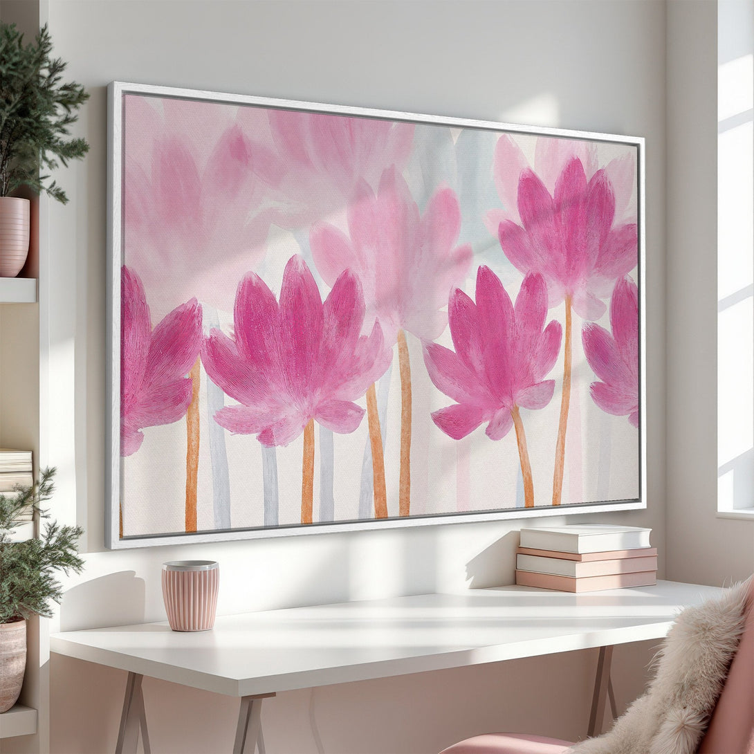 Framed Wall Art featuring a floral watercolor painting in a pink and neutral palette. Perfect for adding a touch of elegance to any space.